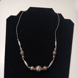 Vintage liquid silver tone necklace  engraved  beads southwestern boho screw cla